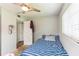 Bedroom features neutral walls, a ceiling fan and a window providing natural light at 5710 92Nd N Ter, Pinellas Park, FL 33782
