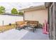 Cozy patio area with a sectional sofa, glass coffee table, and neutral color scheme at 5710 92Nd N Ter, Pinellas Park, FL 33782