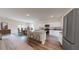 Open-concept kitchen and dining area featuring modern appliances and a kitchen island at 14673 Italy Ave, Dade City, FL 33523