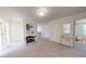 Upstairs loft area with carpet flooring and natural light, perfect for relaxing at 14673 Italy Ave, Dade City, FL 33523