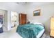 The spacious main bedroom features a private ensuite bathroom and ample closet space at 232 Countryside Key Blvd, Oldsmar, FL 34677