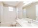 Bathroom featuring white tile, vanity with marble countertop, and combination tub and shower at 24237 Rolling View Ct, Lutz, FL 33559