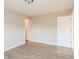 Bedroom with wood-look floors and neutral walls, offering a versatile space at 24237 Rolling View Ct, Lutz, FL 33559