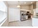 Eat-in kitchen features stainless-steel appliances and ample storage at 24237 Rolling View Ct, Lutz, FL 33559