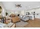 Open-concept living space featuring a dining area, modern furniture, and a bright, airy atmosphere at 2919 Cascabel Ter, North Port, FL 34286