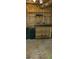 Basement space with wooden shelves and storage options at 5148 Cyril Dr, Dade City, FL 33523