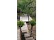 View of waterfront deck with table and chairs in the backyard at 5148 Cyril Dr, Dade City, FL 33523