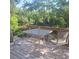 Secluded outdoor deck, ideal for enjoying the tranquility of nature at 5148 Cyril Dr, Dade City, FL 33523