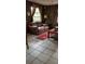 Comfortable living room with rich leather furniture and rustic decor at 5148 Cyril Dr, Dade City, FL 33523
