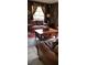 Inviting living room with a comfortable sofa and rustic accents at 5148 Cyril Dr, Dade City, FL 33523