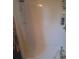 Bathroom shower with shower curtain and built-in shelving to keep your essentials handy at 5148 Cyril Dr, Dade City, FL 33523
