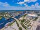 Beautiful aerial view highlighting the city skyline, waterways, and bridge, emphasizing the prime location at 1209 E Cumberland Ave # 2101, Tampa, FL 33602