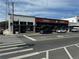 Street view featuring buildings with retail shops and local businesses with visible storefronts and pedestrian crosswalk at 14684 Italy Ave, Dade City, FL 33523