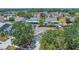 Community aerial view of single-Gathering homes with fenced yards and backyard pools at 205 Island Water Way, Apollo Beach, FL 33572