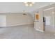Spacious floor plan highlighting the transition to the dining room, kitchen, and living space at 205 Island Water Way, Apollo Beach, FL 33572
