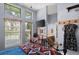 Bright bedroom with large windows, en-suite bathroom, and picturesque view at 36846 Perry Ct, Dade City, FL 33525