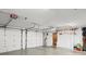 Spacious garage with multiple bays, ample storage, and bright overhead lighting at 36846 Perry Ct, Dade City, FL 33525
