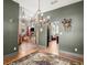Open hallway offering views into living room and kitchen at 36846 Perry Ct, Dade City, FL 33525