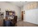 This home office features a custom desk and storage, closet, and neutral carpet at 36846 Perry Ct, Dade City, FL 33525