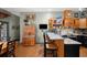 Spacious kitchen with counter seating and breakfast bar with tile backsplash at 36846 Perry Ct, Dade City, FL 33525