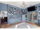 Office with large built-in shelving, hardwood floors and glass doors at 36846 Perry Ct, Dade City, FL 33525