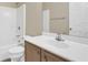 This bathroom features a tub with shower, neutral walls, and a vanity with lots of counter space at 806 Rocky Mountain Ct, Valrico, FL 33594