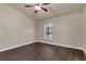 A bedroom boasts hardwood floors, neutral walls, and natural light, creating a serene retreat at 806 Rocky Mountain Ct, Valrico, FL 33594