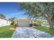 Charming single Gathering home with a well maintained lawn and mature landscaping in a suburban neighborhood at 806 Rocky Mountain Ct, Valrico, FL 33594