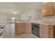 Well-equipped kitchen with appliances, and open design flowing seamlessly into the dining area at 806 Rocky Mountain Ct, Valrico, FL 33594