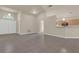 Spacious living room boasts neutral walls, vaulted ceilings, and tile flooring throughout the space at 806 Rocky Mountain Ct, Valrico, FL 33594