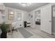 Chic office area leading to a cozy bedroom, perfect for work and rest at 5651 Kelly N Dr, St Petersburg, FL 33703