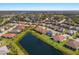 Wide aerial shot of a neighborhood surrounding multiple ponds on a sunny day at 2532 Avolet Ct, Lakewood Ranch, FL 34211