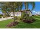 Charming single-story home featuring a three-car garage, and mature landscaping at 2532 Avolet Ct, Lakewood Ranch, FL 34211