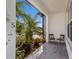 Relaxing outdoor patio seating with beautiful plants and great views at 2532 Avolet Ct, Lakewood Ranch, FL 34211