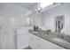 Bathroom with white marble walk-in shower, granite countertops and dual sinks at 146 51St Street E Cir, Palmetto, FL 34221