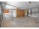 Spacious garage interior, ideal for storage and projects, with access door and utilities at 2302 16 W St, Palmetto, FL 34221