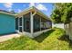 Enclosed back porch with screens, providing a bug-free outdoor relaxation area at 2302 16 W St, Palmetto, FL 34221