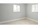 Cozy bedroom with natural light, tiled floors, and neutral paint at 4651 Helena Ne St, St Petersburg, FL 33703