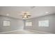 Spacious bedroom with neutral walls, ceiling fan, recessed lighting, and natural light at 4651 Helena Ne St, St Petersburg, FL 33703