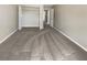 Cozy bedroom featuring plush carpeting, a closet with double doors, and neutral-toned walls at 915 Woodbridge Ct, Safety Harbor, FL 34695