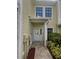 Charming home exterior with well-maintained landscaping and a welcoming entrance at 915 Woodbridge Ct, Safety Harbor, FL 34695