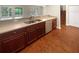 Spacious kitchen with stainless steel dishwasher and spacious countertops at 915 Woodbridge Ct, Safety Harbor, FL 34695