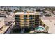 Enjoy breathtaking aerial view of the building, pool and beach from above at 14146 Gulf Blvd # 3A, Madeira Beach, FL 33708