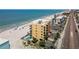 Aerial view of condo with pool, beach access, and beachfront parking at 14146 Gulf Blvd # 3A, Madeira Beach, FL 33708