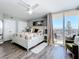 Spacious main bedroom with private balcony, neutral paint, and an abundance of natural light at 14146 Gulf Blvd # 3A, Madeira Beach, FL 33708