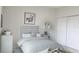Charming room with neutral decor and a framed deer print above the bed at 1160 Edinburgh St, North Port, FL 34288