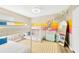 Colorful bedroom featuring a bunk bed with disco ball accents and a playful theme at 9497 122Nd Way, Seminole, FL 33772