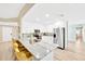 Bright, stylish kitchen featuring a spacious island with seating, stainless steel appliances, and modern finishes at 9497 122Nd Way, Seminole, FL 33772