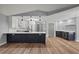 Spacious kitchen featuring a large island with seating, stainless steel appliances and modern finishes at 1438 Mclin Dr, Plant City, FL 33565