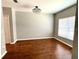 Dining room with wood floors, neutral paint and chandelier at 5864 Fishhawk Ridge Dr, Lithia, FL 33547